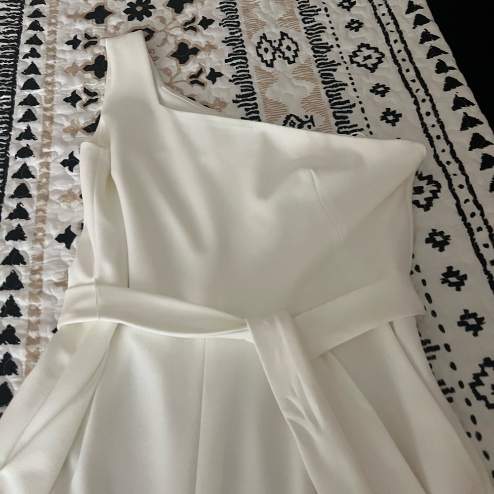 Elegant one shoulder creamy white jumpsuit. Never worn.